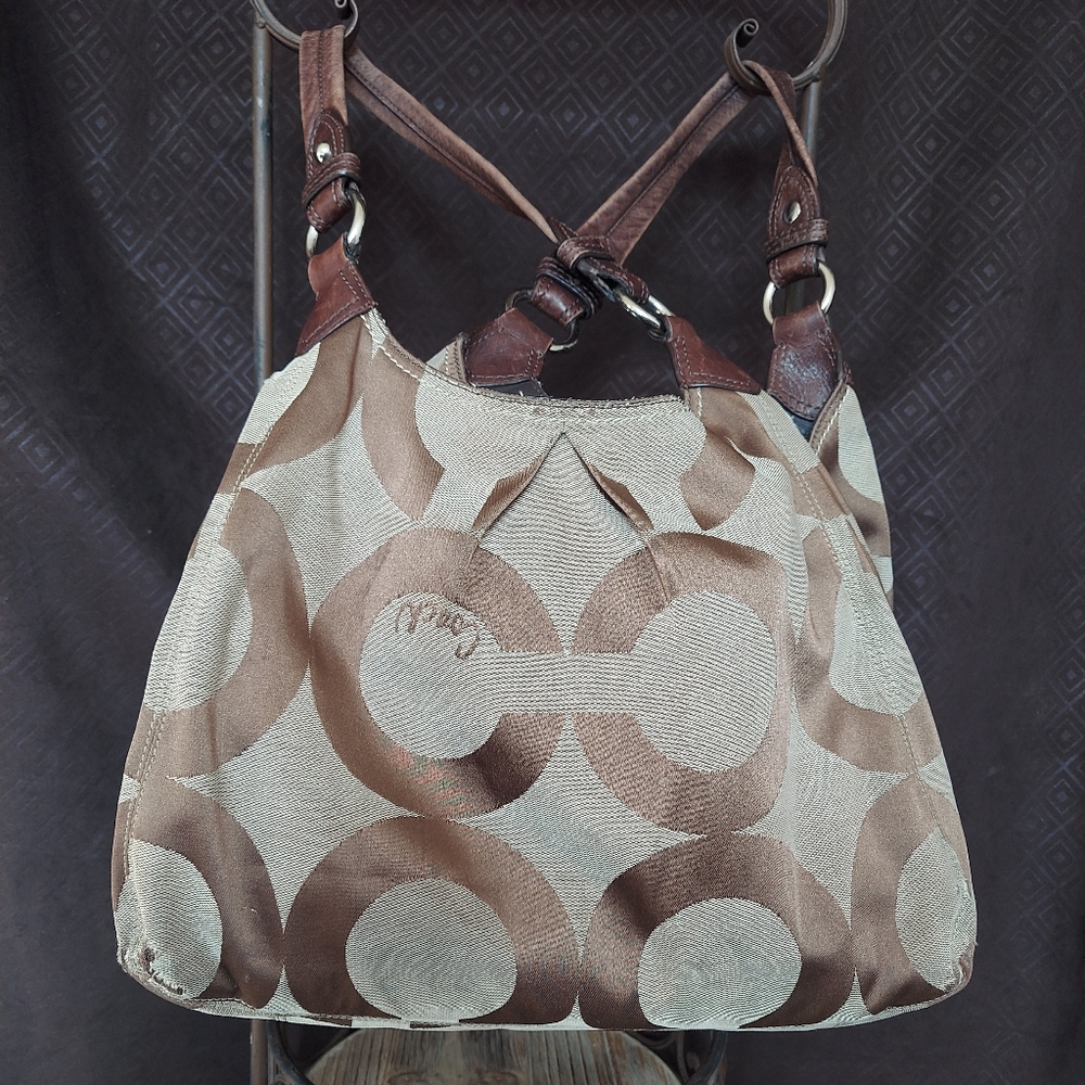 Large Coach satchel. See pics for wear on corners and straps